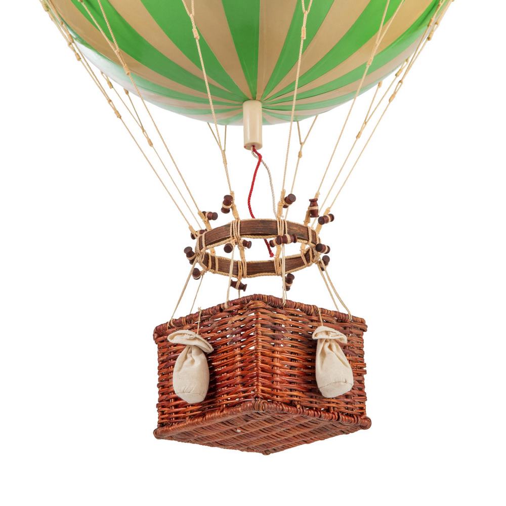 Hot air balloon with green and beige striped balloon and wicker basket on a white background