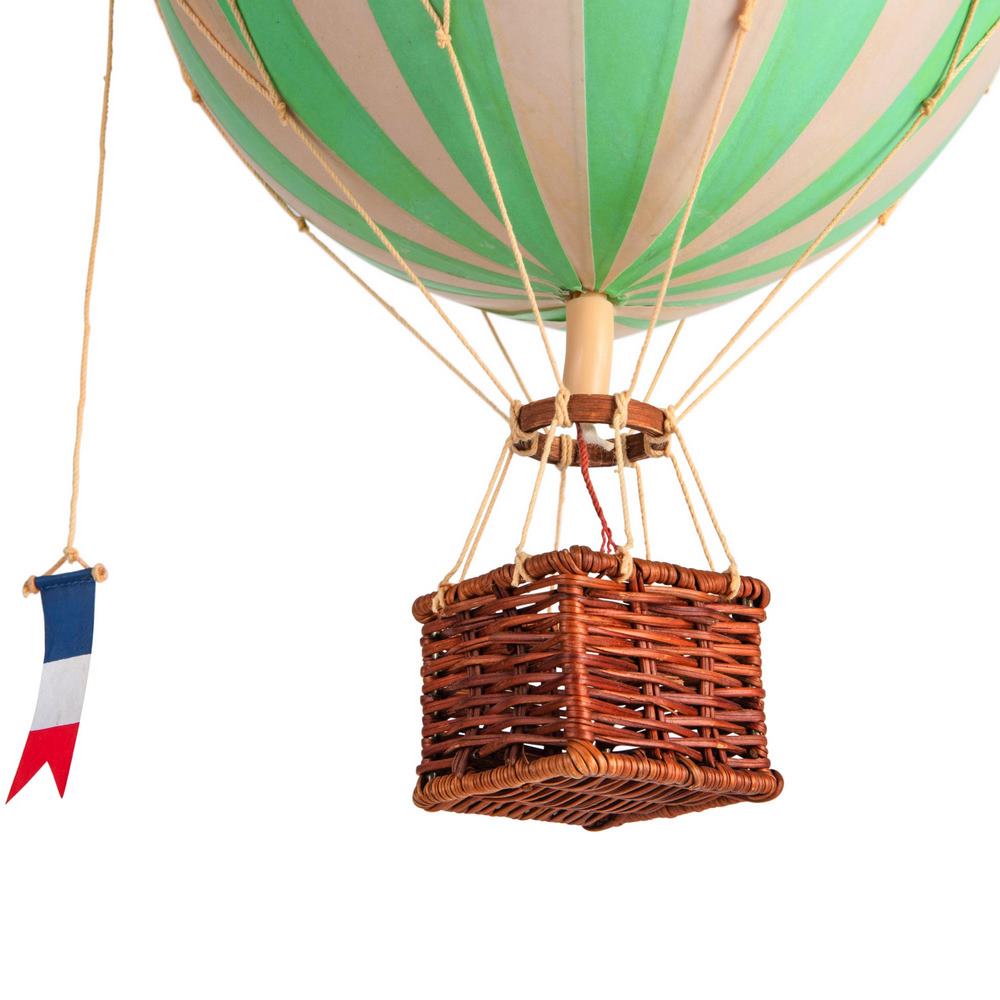 Hot air balloon with green and beige striped balloon and wicker basket on a white background