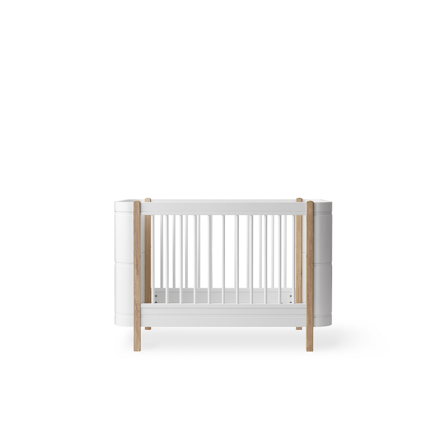 White crib with wooden sides on a white background