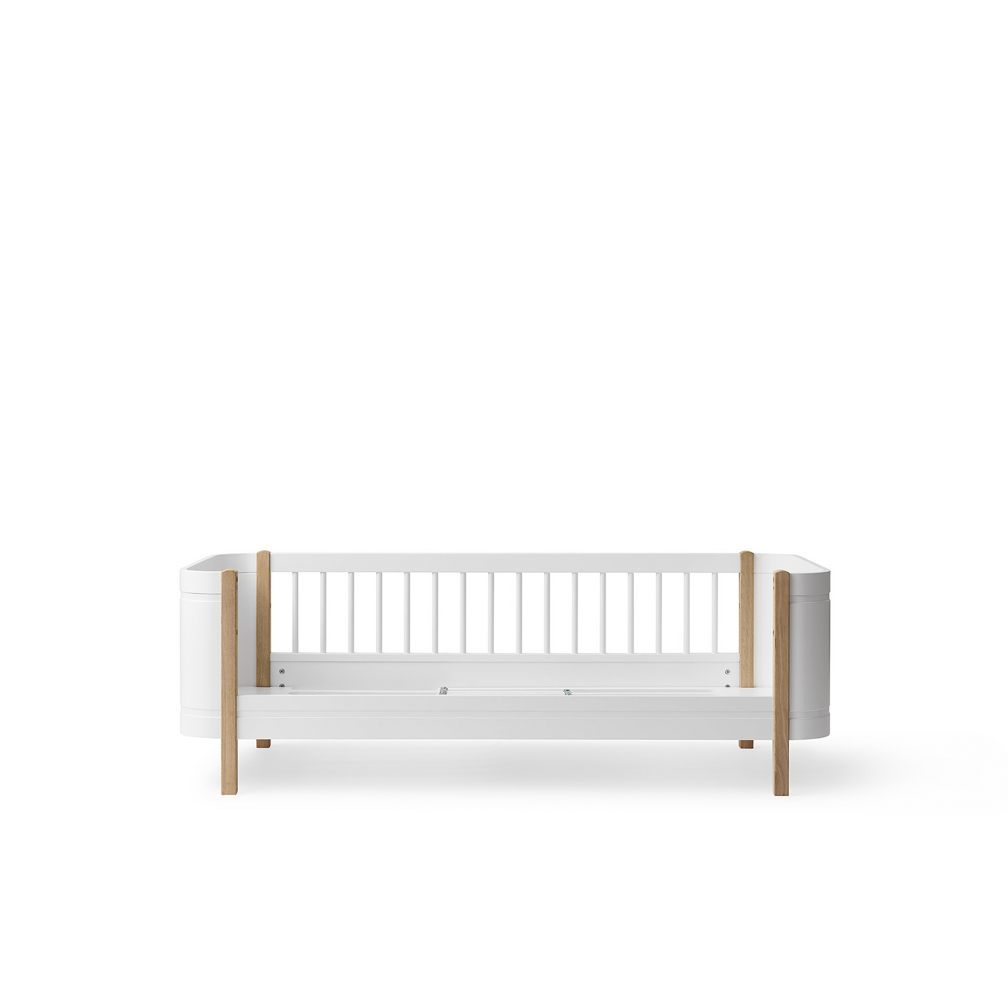 White crib with wooden accents on a white background