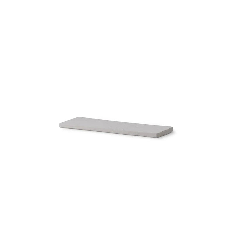 Rectangular light gray shelf on a white background