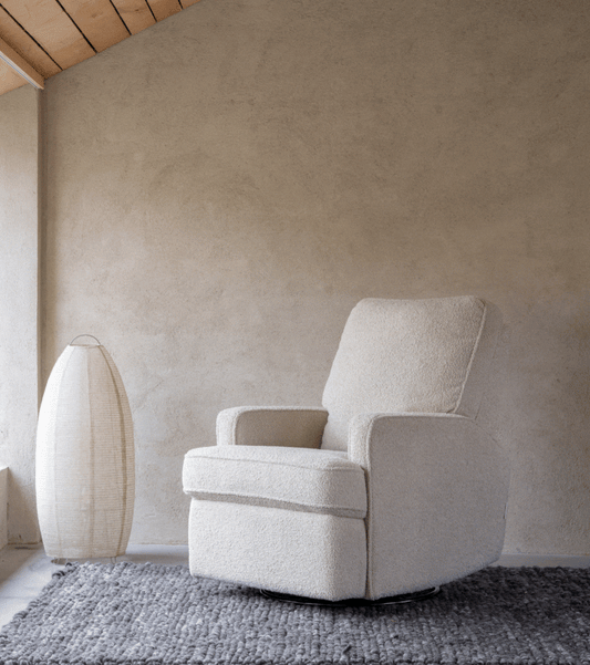 Adaptable White Nursing Chair with extended leg resy and glide motion