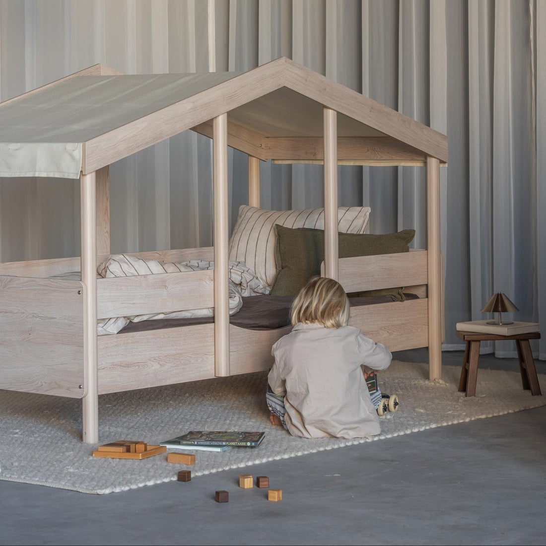 Wooden kids cabin bed in a children's bedroom - perfect for toddlers and young children