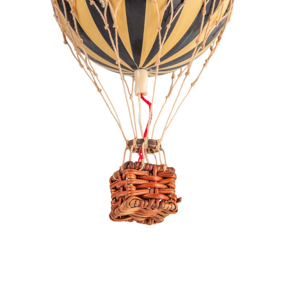 Hot air balloon with striped design and wicker basket on a white background