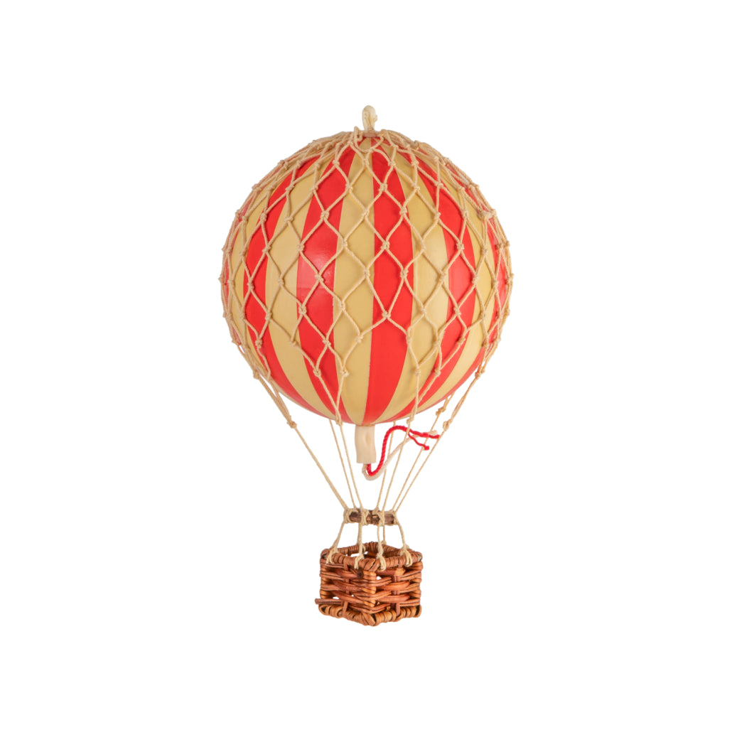 Model hot air balloon with red and beige striped design on a white background