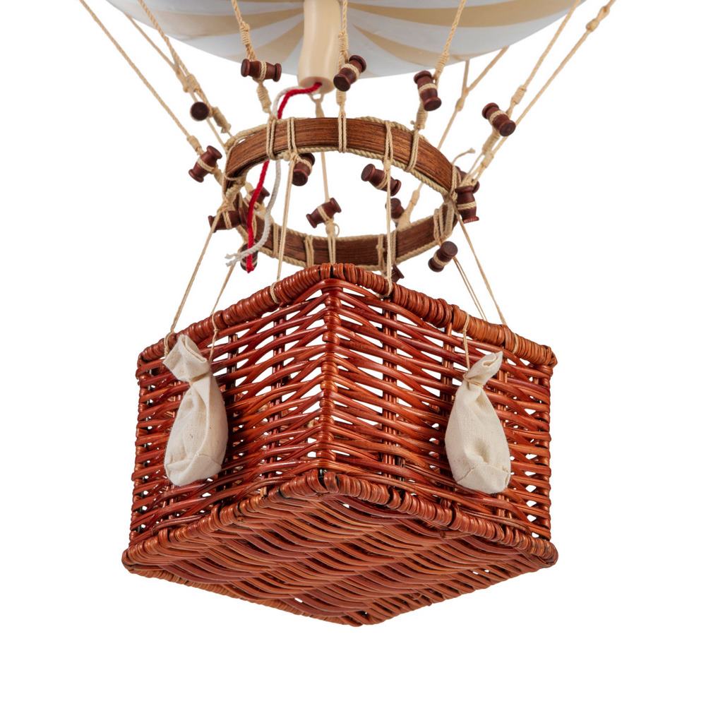Wicker basket of a hot air balloon on a white background