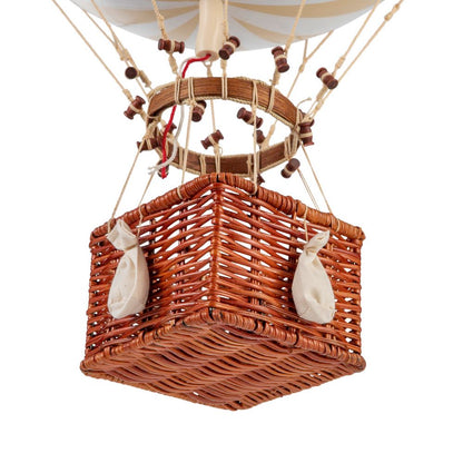 Wicker basket of a hot air balloon on a white background