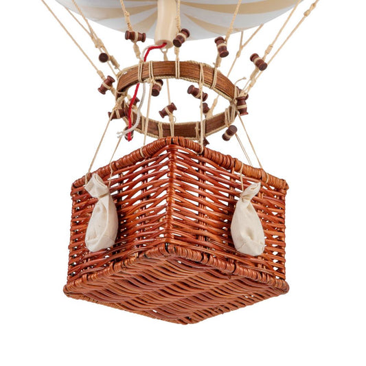 Wicker basket of a hot air balloon on a white background