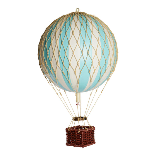 Model hot air balloon with a wicker basket on a white background