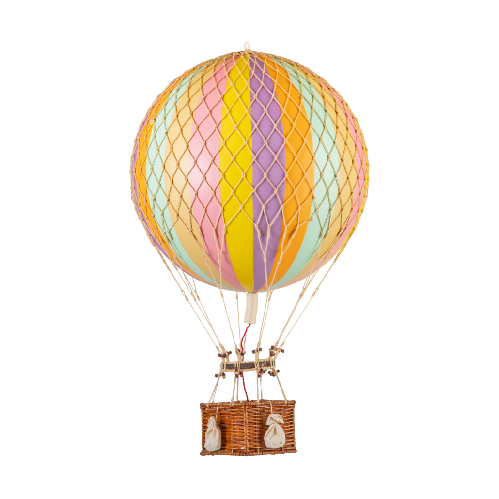 Colorful hot air balloon with a wicker basket on a white background