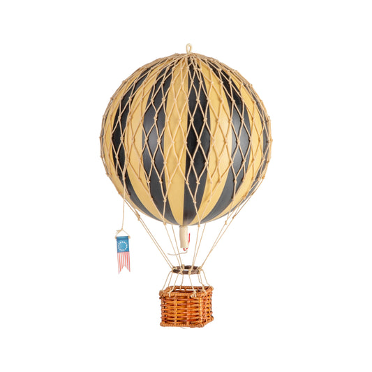 Model hot air balloon with striped design on a white background
