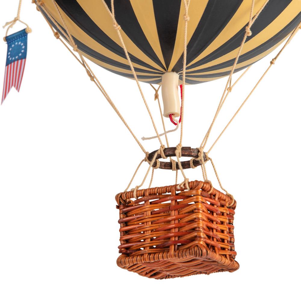 Hot air balloon with striped design and wicker basket on a white background