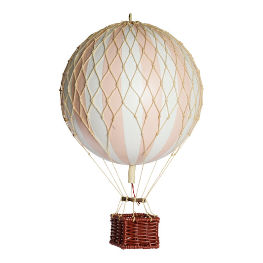 Decorative hot air balloon with a wicker basket on a white background