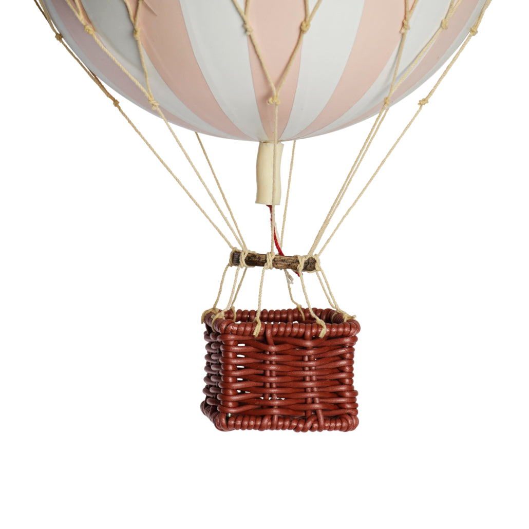 Hot air balloon with striped balloon and wicker basket on a white background