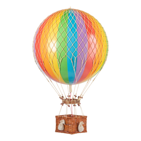 Colorful hot air balloon with a wicker basket on a white background