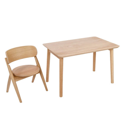 A light natural wood children's table and matching chair set, photographed on a clean white background.