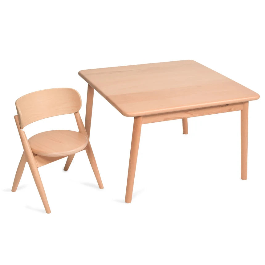 Wooden table and chair set on a white background
