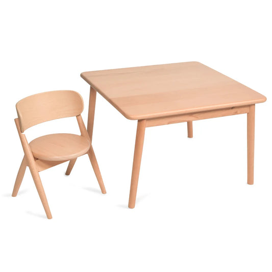 Wooden table and chair set on a white background