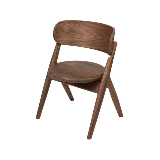 A mid-century modern kids wooden dining chair with a curved backrest, circular seat, and angled splayed legs, shown on a solid white background.