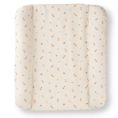 Textured quilted pad with small patterns on a white background