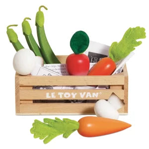 Set of wooden toy vegetables in a crate with 'Le Toy Van' branding on a white background