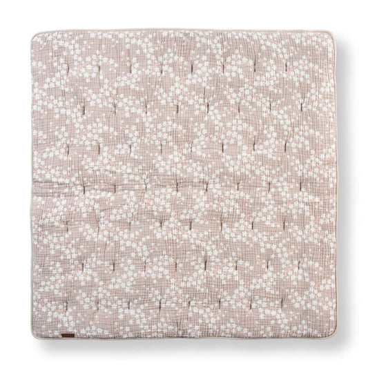 Floral patterned fabric square on a white background