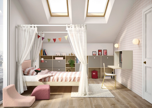 Four-poster bed with white curtains and colorful bedding on a white background