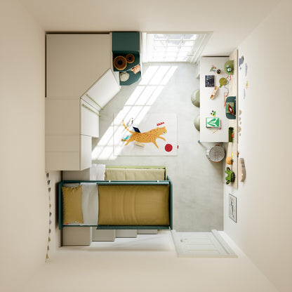 Small room with a skylight, colorful wall art, and various items on shelves.