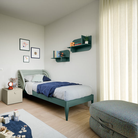 Modern KIDS bedroom with green bed frame, white bedding, and decorative items.
