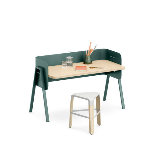 Green and wooden kids desk with a white stool on a white background