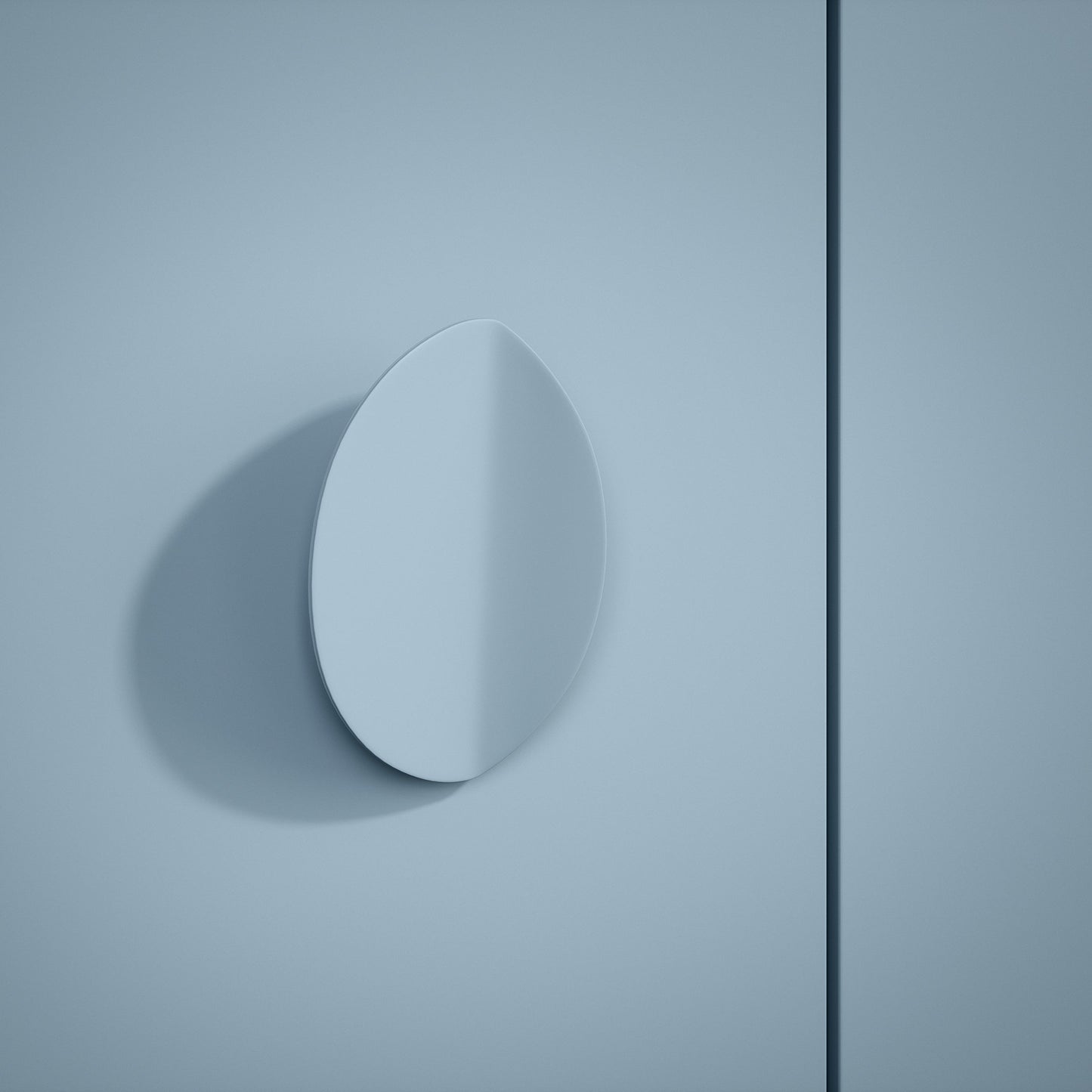 White oval object on a light blue background