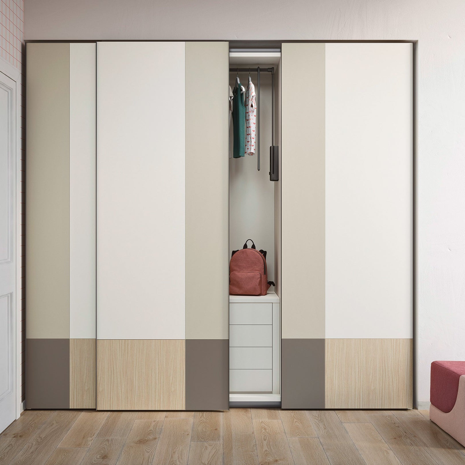 Modern wardrobe with striped doors in a room with wooden flooring.
