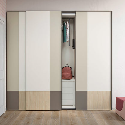 Modern wardrobe with striped doors in a room with wooden flooring.
