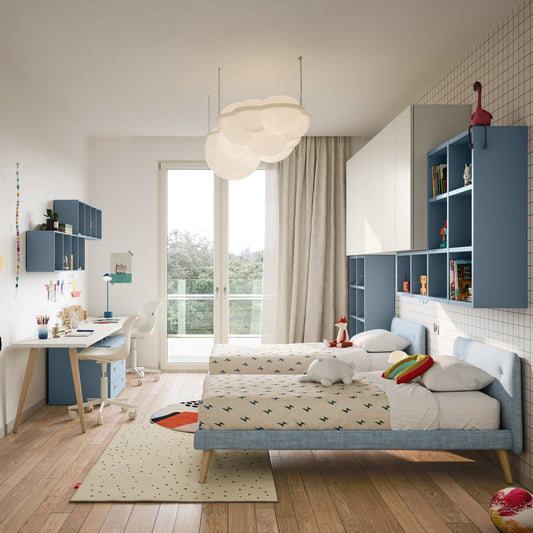 Modern Nidi kids bedroom with twin beds, long study desk, and blue modular storage unit