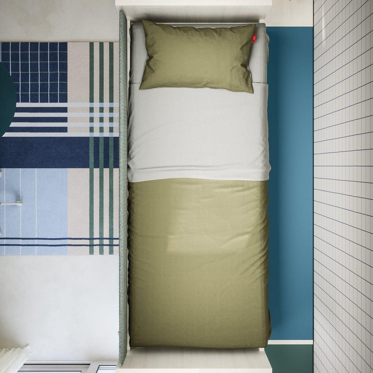 Top-view of Nidi Kids Space 12 bed with green duvet, blue wall panel and graphic patterned rug.