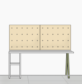 Pegboard with pre-drilled holes on a desk