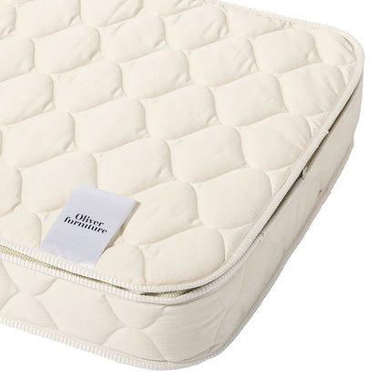 Quilted mattress cover with a visible brand label on a white background