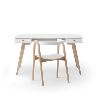 White desk with wooden legs and a chair on a white background