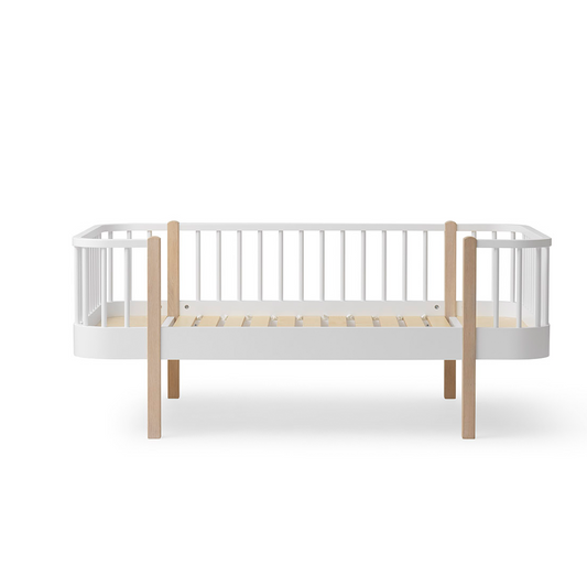 White DAYBED with wooden sides on a white background