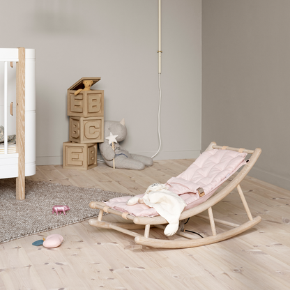 oak rocker with a pink liner