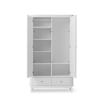 White wardrobe with open doors on a white background