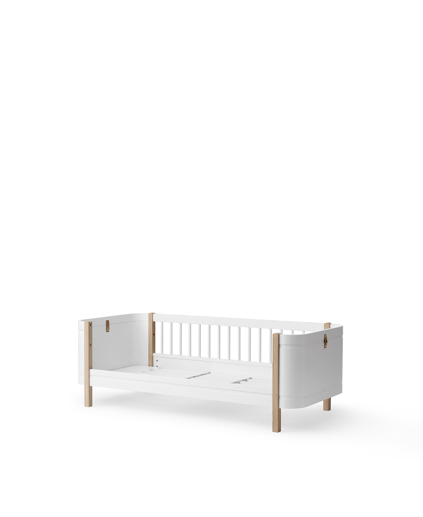 White crib with wooden accents on a white background