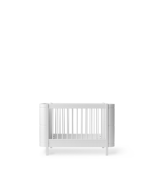 White crib on a white background
