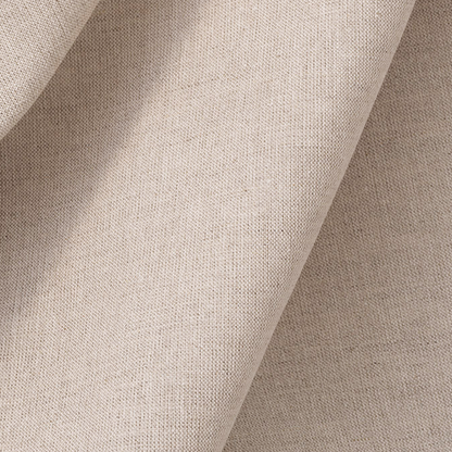 Close-up of beige fabric with a textured pattern