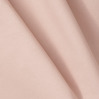 Close-up of beige fabric with a subtle texture
