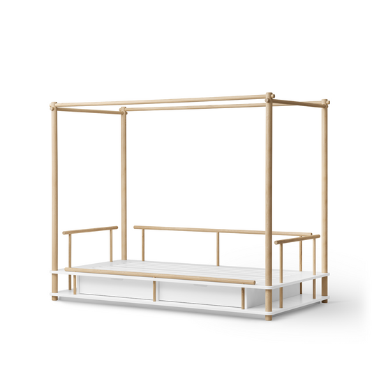 Wooden canopy bed frame on a white background