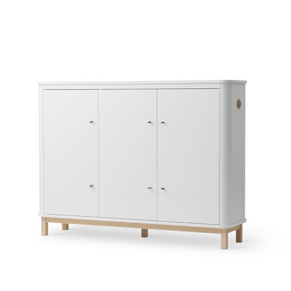 White cabinet with wooden legs on a white background