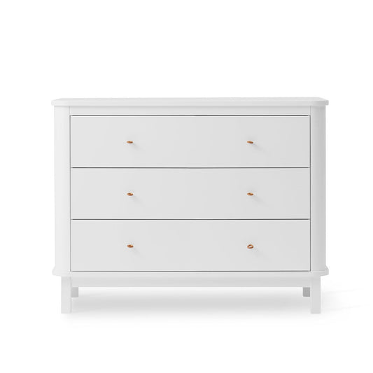 White dresser with gold handles on a white background