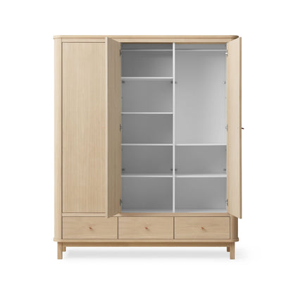 Wooden wardrobe with open doors on a white background