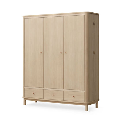 Wooden wardrobe with four doors and three drawers on a white background